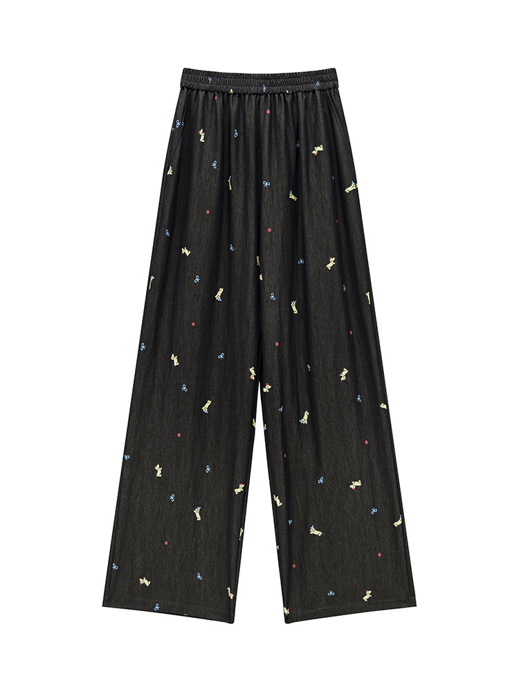 Black wide-leg pants with small colorful all-over pattern