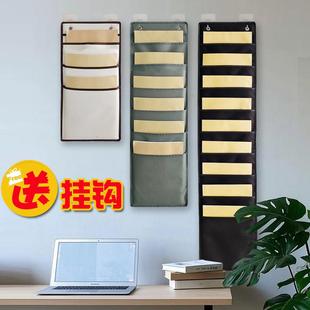 书本收纳挂袋门后收纳袋墙壁挂式绘本杂志多层整理袋宿舍教室储物