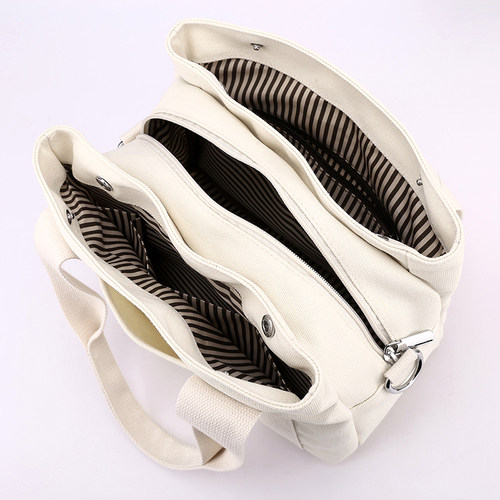 新款千层多分格帆布斜跨小拎包