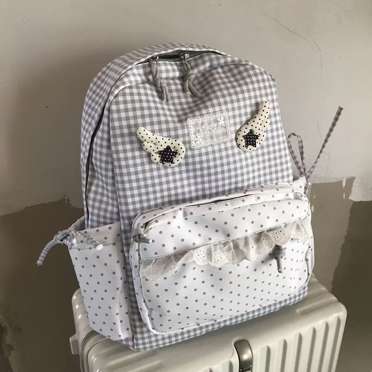 日系灰格天使翅膀书包 软妹蕾丝波点少女双肩包 初高中大容量背包图片