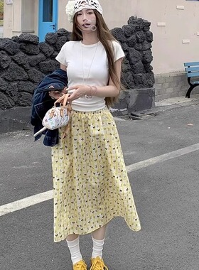 韩系穿搭碎花发财黄色蛋糕裙女中长款春夏季长裙设计感a字半身裙