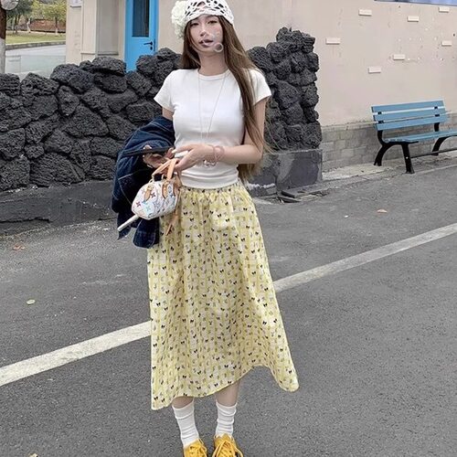韩系穿搭碎花发财黄色蛋糕裙女中长款春夏季长裙设计感a字半身裙