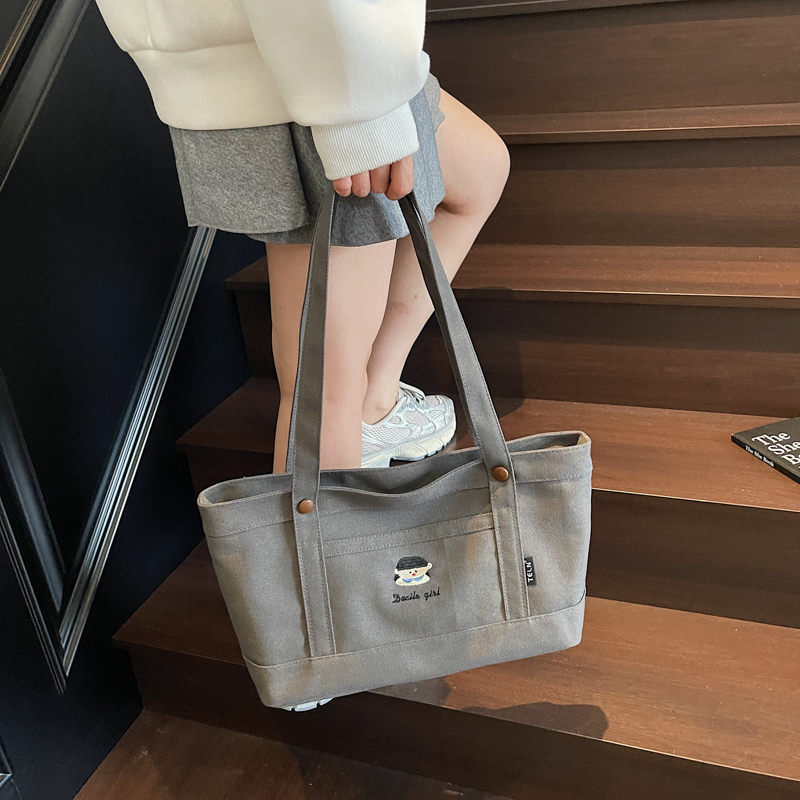 加厚通勤帆布包简约小巧容量大