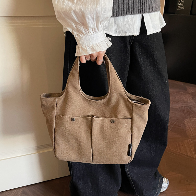 帆布包超火上班杂物小拎包通勤高级感小手提袋精致外出手拎布包女,箱包皮具/热销女包/男包,时尚帆布包,淘宝优惠券,粉丝福利购,淘宝优惠卷