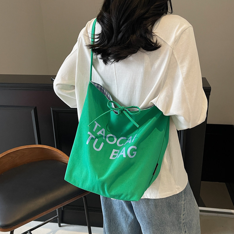 轻便女布包单肩斜挎包新款购物包
