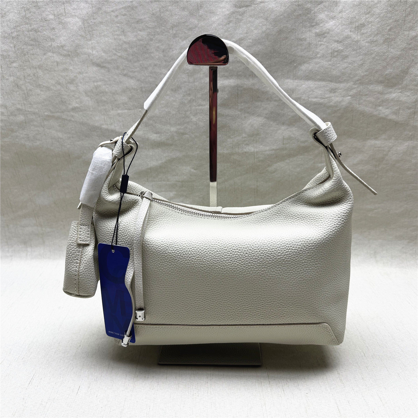 comely/康莉正品撤柜气质时尚单肩斜挎手提女包新款牛皮饺子包