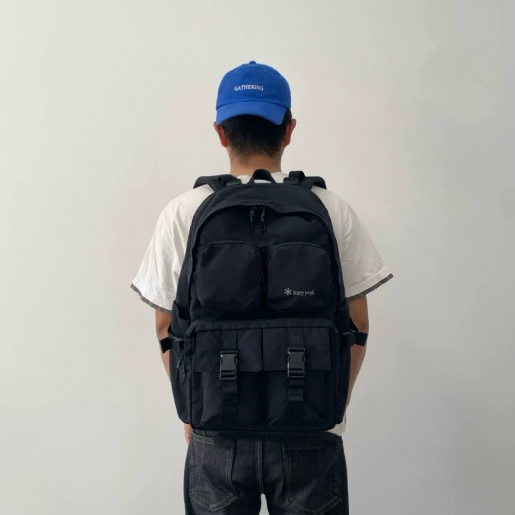 雪峰新款防水轻便户外运动登山包男女同款休闲大容量双肩背包27L