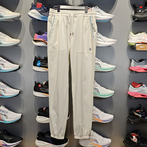 Lining/李宁正品2023新款女子宽松束脚透气梭织运动长裤AYKT434-1