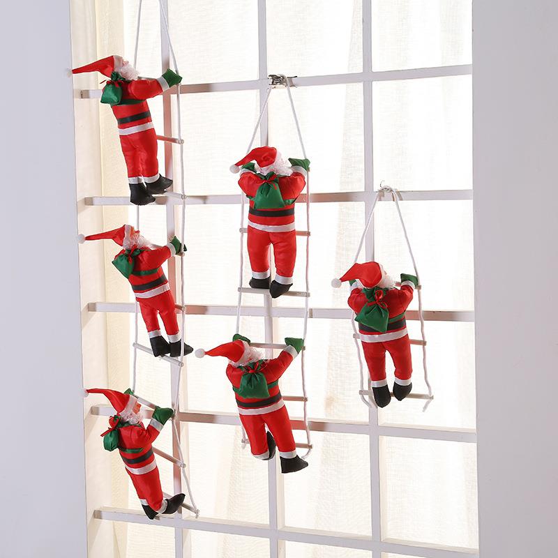 Christmas pendant shopwindow Climb the ladder Santa decorate