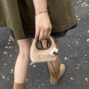 毛茸茸mini包包女2026新款毛绒毛毛手拎小包包可爱口红耳机配饰包