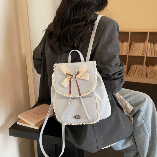 甜美少女蝴蝶结学生双肩包日常