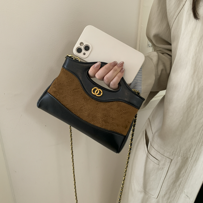 简约轻奢包包女式2025秋冬新款小众水桶包高级感菱格链条斜挎包女