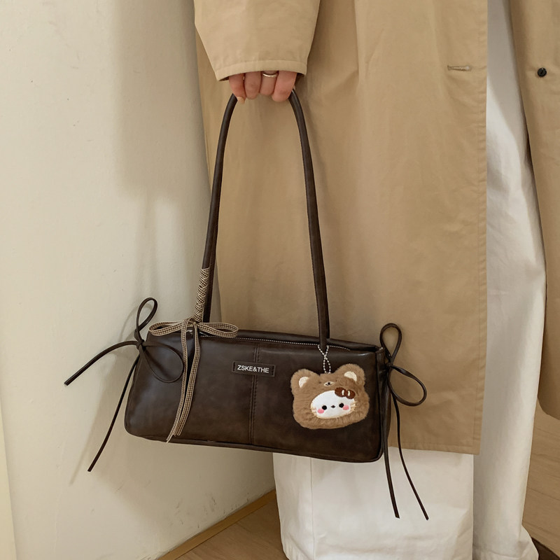 美拉德棕复古法棍包女2025新款高级感小众通勤休闲百搭单肩腋下包,箱包皮具/热销女包/男包,腋下包,淘宝优惠券,粉丝福利购,淘宝优惠卷