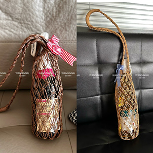 拉菲草编保温杯手提网兜便携袋手工编织定制木手挽酒袋小众礼物