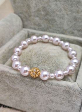 曼塔玫瑰色施家珍珠手链女 弹力绳手串叠戴百搭极简小众高级