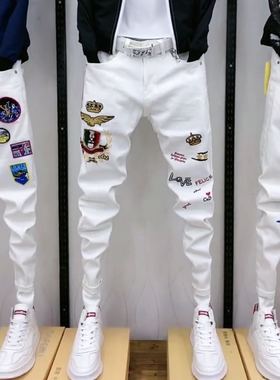 白色贴标刺绣欧洲站印花牛仔裤男士潮牌弹力修身精神小伙小脚裤子