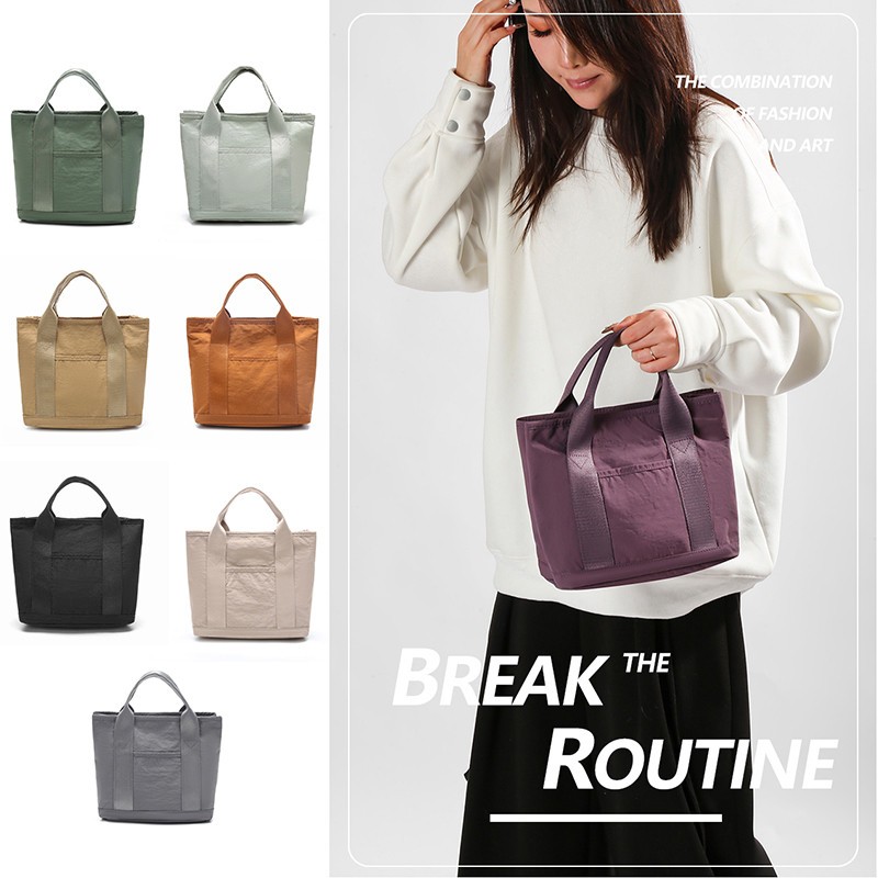 森系简约小拎包女通勤百搭手提袋轻便尼龙布防水收纳便当包妈咪包