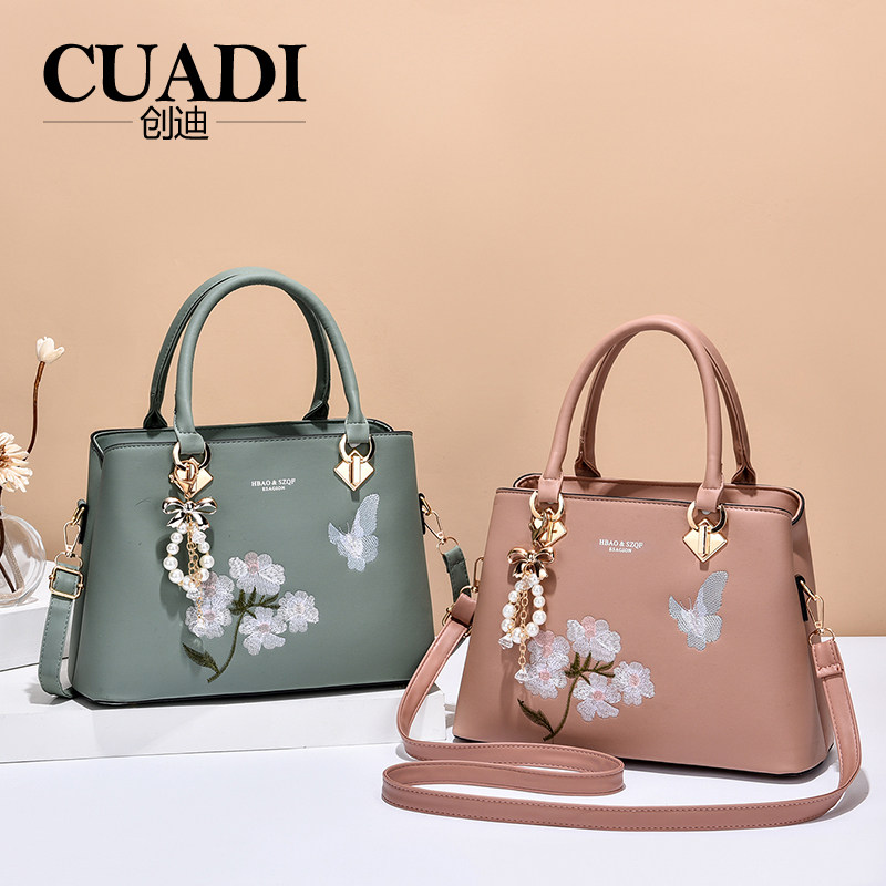 CUADI/创迪个性刺绣大容量女包百搭中年妈妈包单肩斜挎时尚手提包