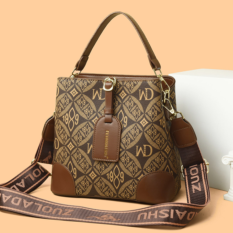 （长24高20厚11cm）高品质印花时尚复古水桶包 1987棕色,箱包皮具/热销女包/男包,通用款女包,淘宝优惠券,粉丝福利购,淘宝优惠卷