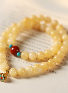 米黄玉石手串六字真言招财转运珠