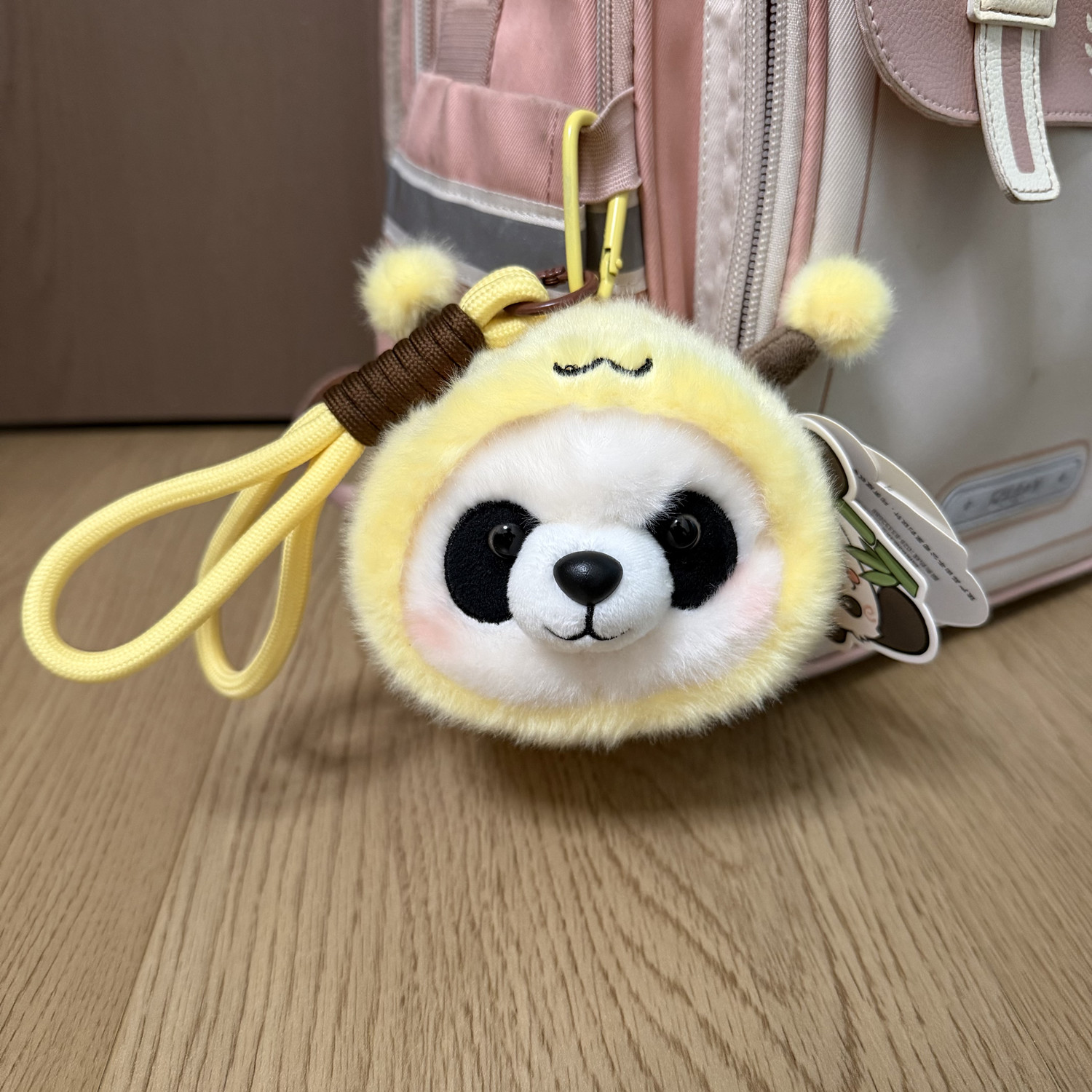 蜜蜂熊猫摇晃发声毛绒包包挂件图片