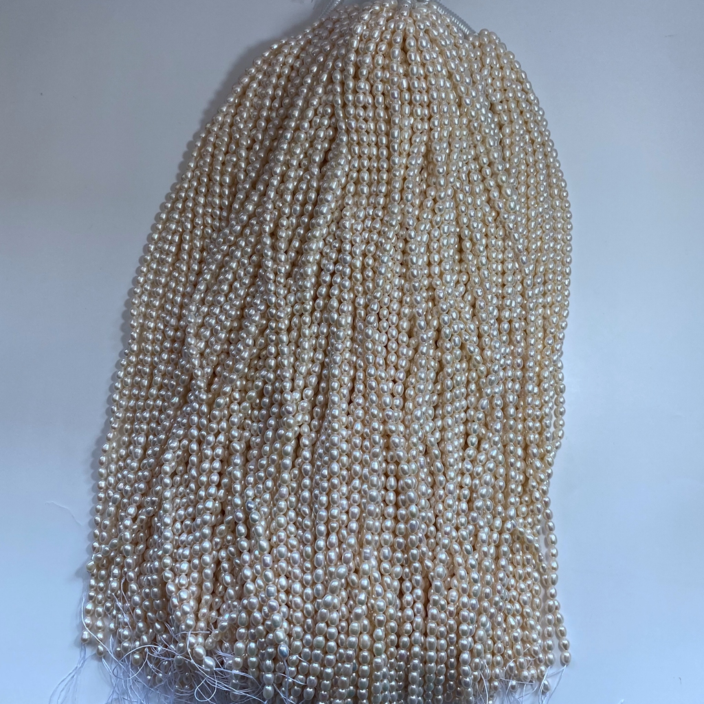 天然白色米形淡水无核珍珠散珠