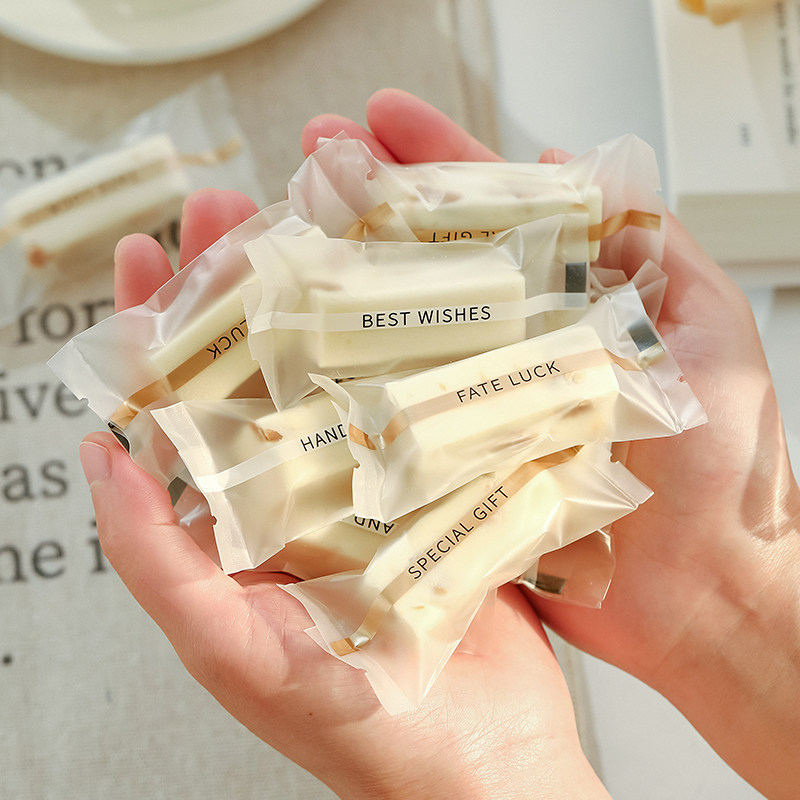 牛轧糖包装袋雪花酥太妃糖果曲奇饼干奶枣单独小零食自粘透明机封