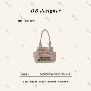 日潮nigo纪念款 变形多隔层帆布爱心托特包