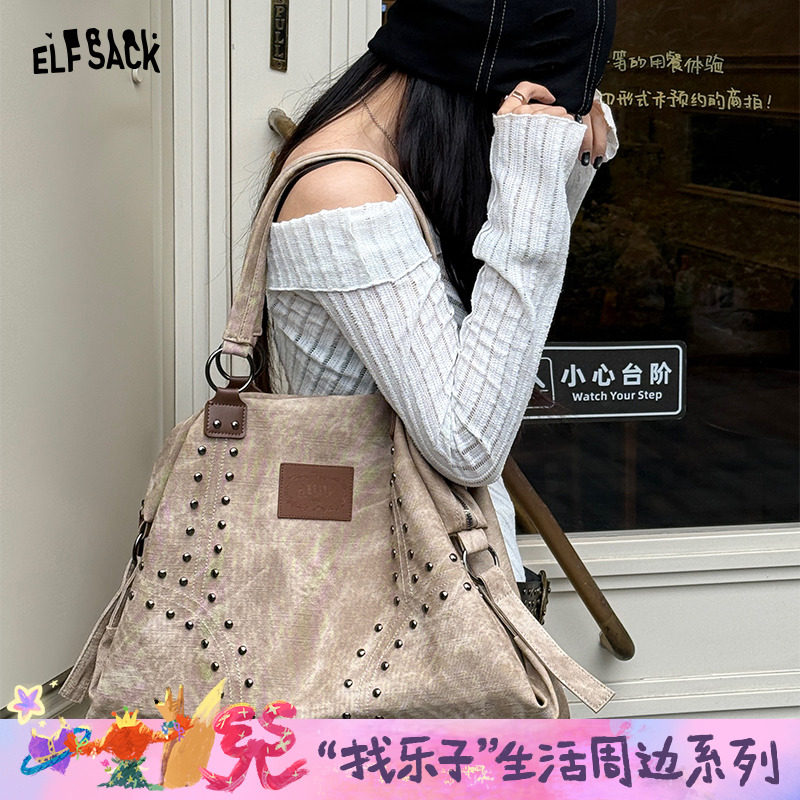 妖精的口袋废土风铆钉单肩包女2025年秋季新款大容量甜酷手提包