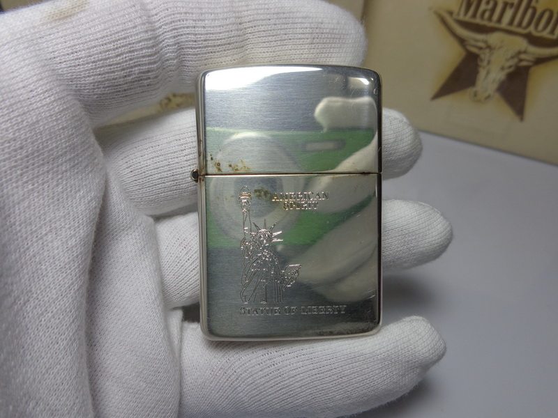原装80年代全新首版斜底刻纯银镜面蚀刻自由女神防风打火机ZIPPO