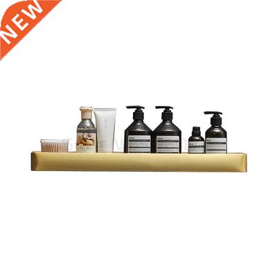 The gold bathroom shelf n the tolet can store bathroom