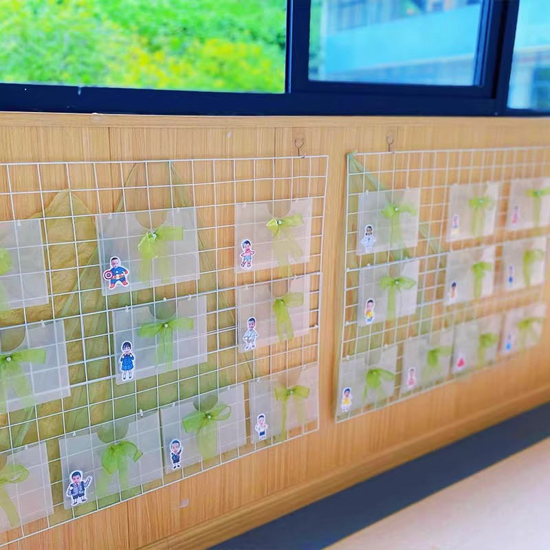 幼儿园阅读区环创透明挂袋语言区