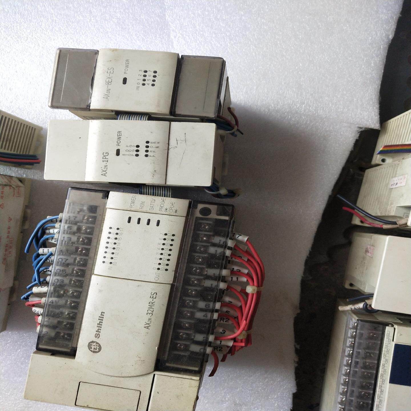 处理拆机的土林PLC两套型号是AⅩ2N一32MR一ES另加{天意设备},3C数码配件,其它配件,淘宝优惠券,粉丝福利购,淘宝优惠卷