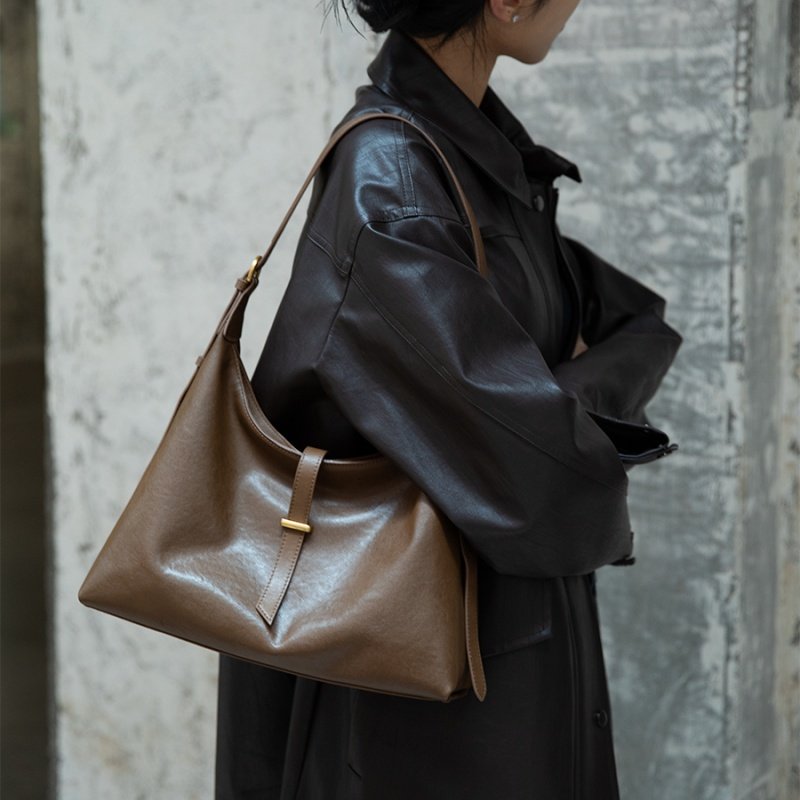 欧米OMI女包2025新款时尚牛皮单肩斜挎包大容量通勤手提托特包包