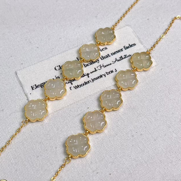 【慕斯格瑞】S925银镶和田玉黄口花朵手链JY0311108011