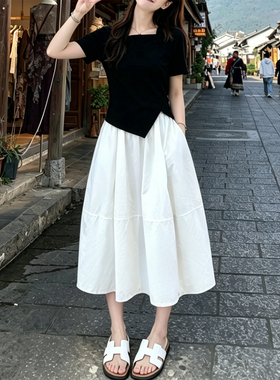 白色半身裙女夏季2026新款高腰A字裙显瘦中长版蓬蓬大摆花苞0523k