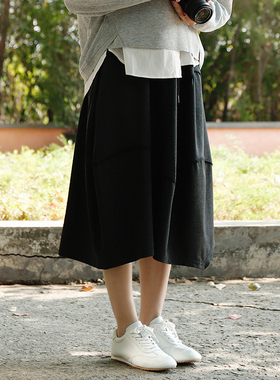 掂量女装 极简风黑色半身裙女中长款拼接设计感A字裙L2V03S14596