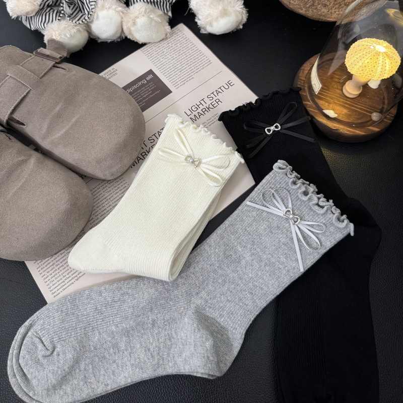 2025秋冬新款袜子女甜美蝴蝶结木耳边潮袜双针纯色棉袜中筒堆堆袜