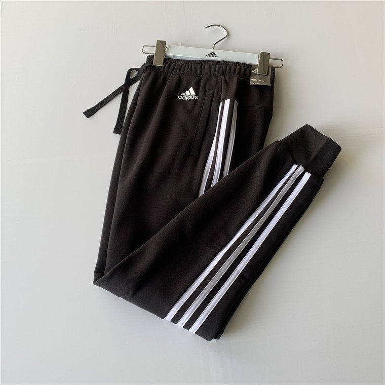 adidas 阿迪达斯女子经典三条纹收腿束口运动针织长裤 S97113