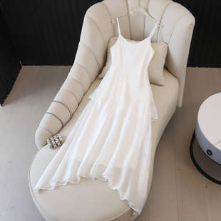 法式温柔风蕾丝无袖吊带连衣裙子女春季2026新款海边度假白色长裙