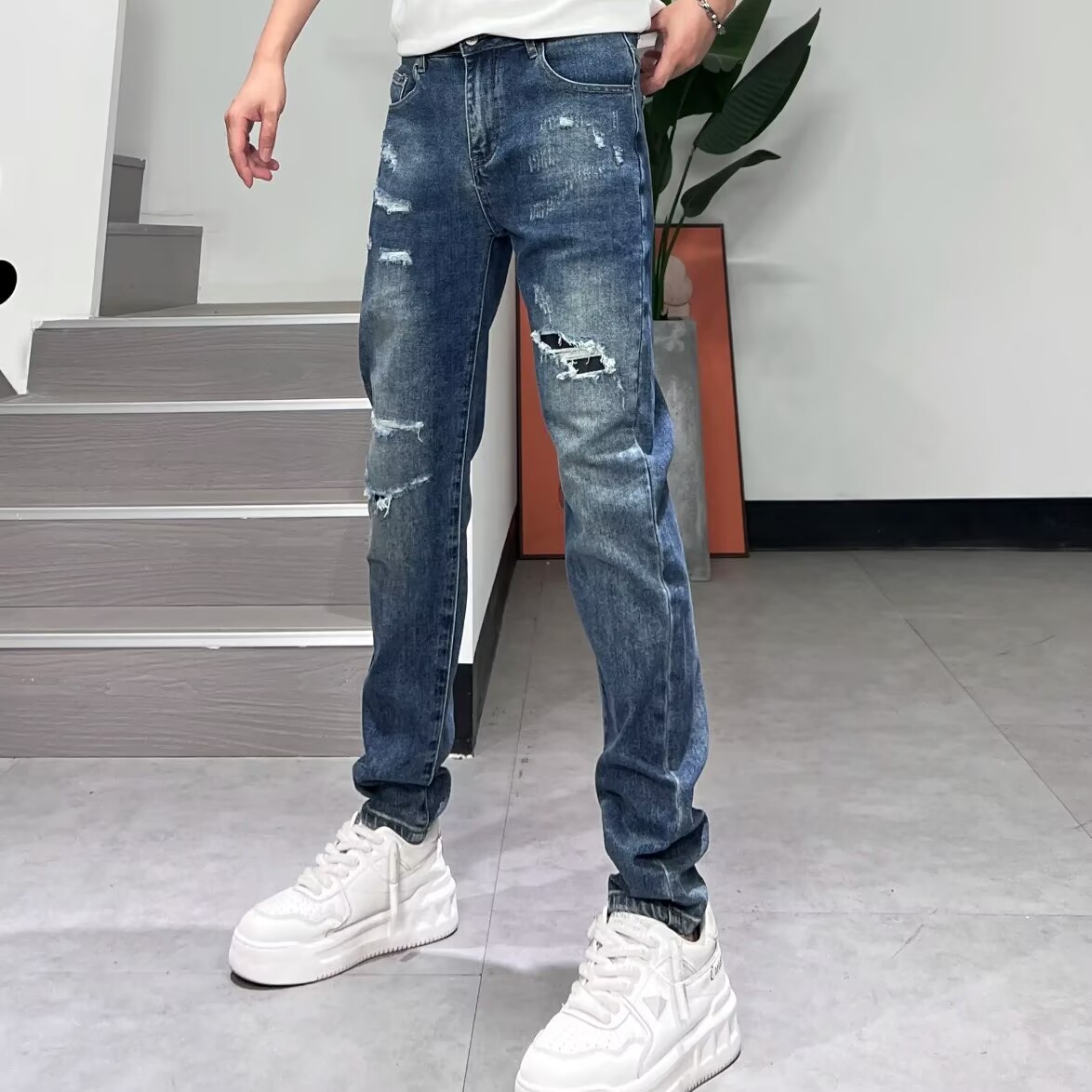 设计款乞丐牛仔裤男破洞补丁