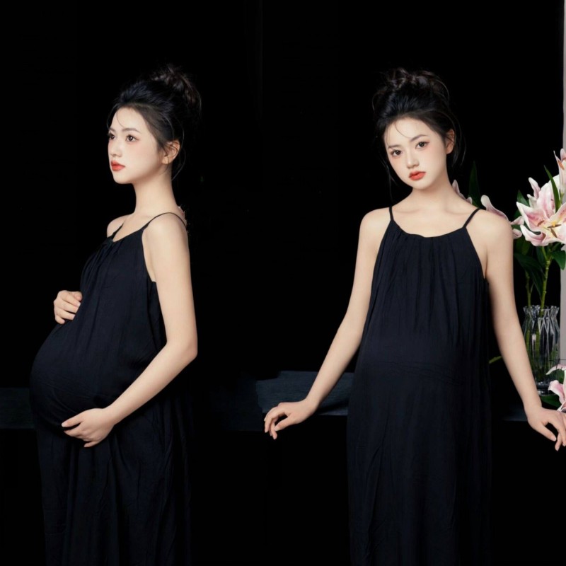 简约黑色吊带裙孕妈艺术照写真