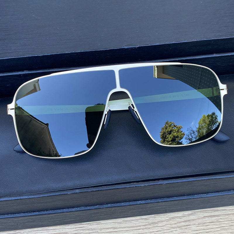 马登新款未来感无螺丝偏光镜超轻时尚百搭墨镜男开车尼龙太阳眼镜