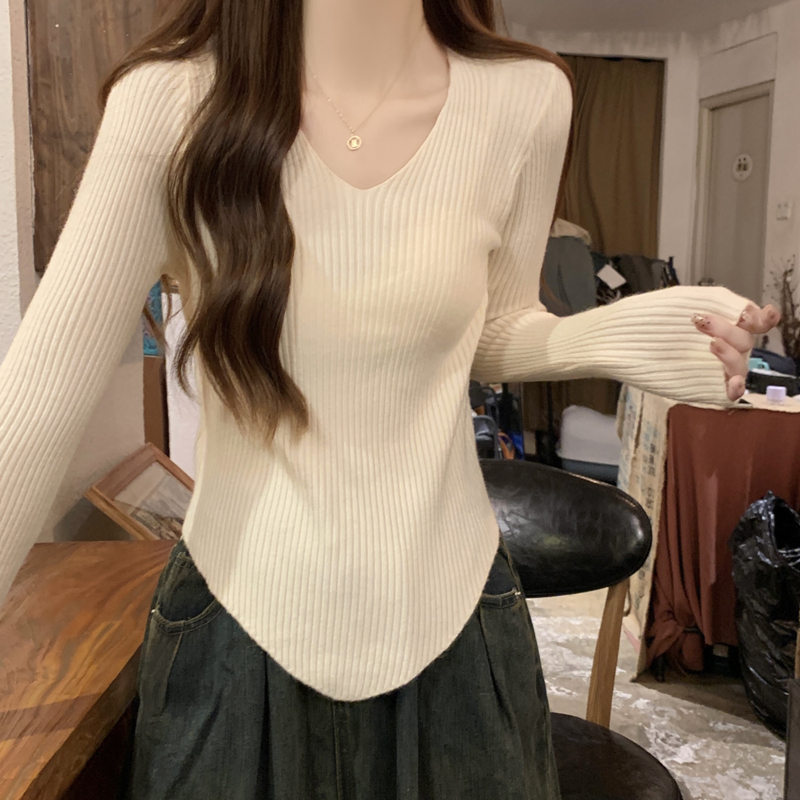不规则弧形下摆毛衣女长袖打底衫