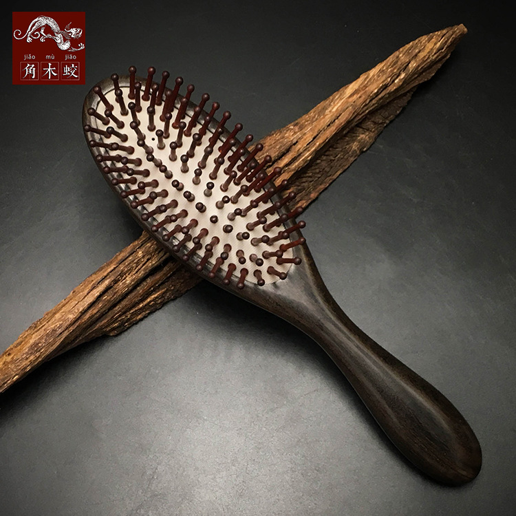 厂家角木蛟沉贵宝气囊梳气垫梳子按美发梳