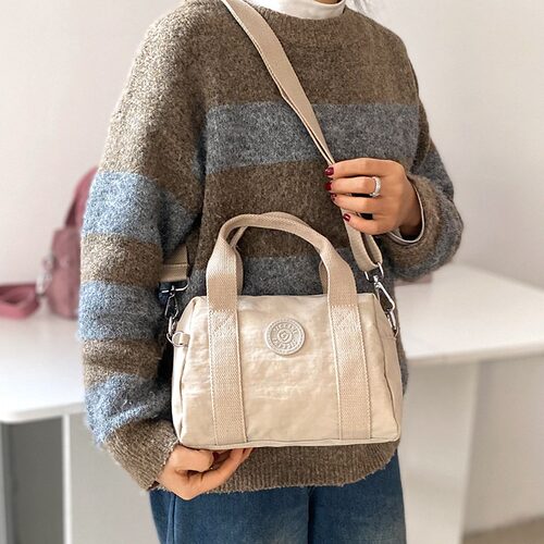 百搭多层斜挎包女简约小包包2026新款尼龙布手拎包迷你单肩帆布包