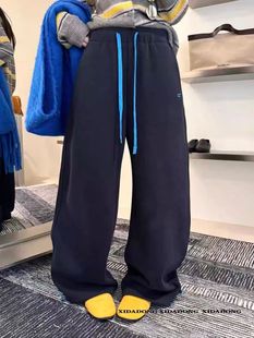 蒂娜25秋冬新款加绒加厚松紧腰抽绳休闲裤女宽松显瘦阔腿弯刀裤