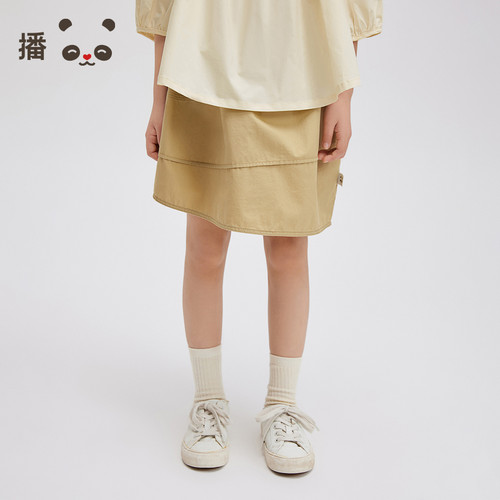 松紧腰身，不规则裙摆