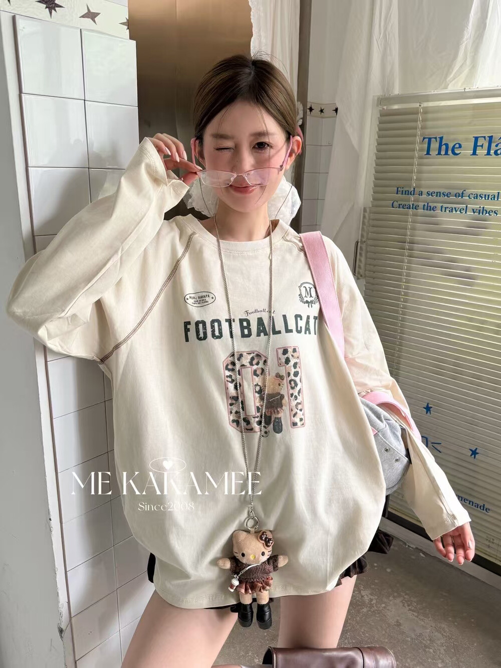ME KAKAMEE秋新品喷画豹纹KT明线设计大版长袖T恤配kitty挂件9588