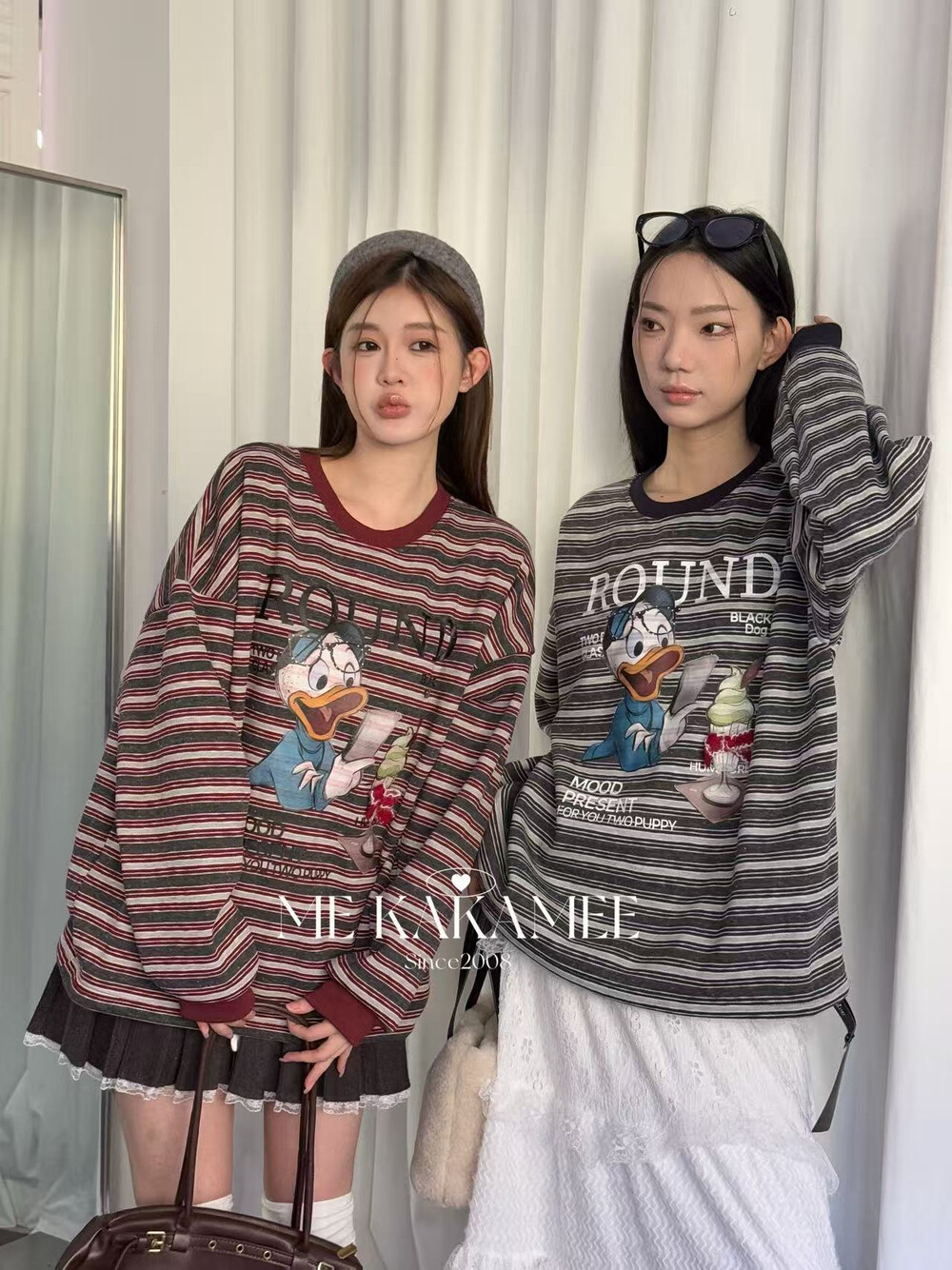 ME KAKAMEE冬新品喷画唐老鸭复合加绒条纹圆领休闲中长款卫衣9029